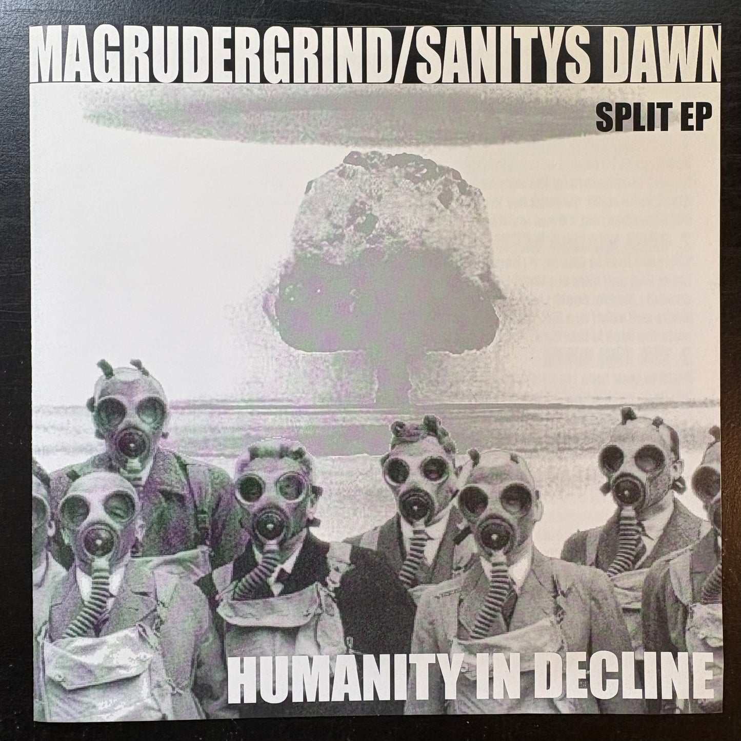 Sanitys Dawn / Magrudergrind, "Humanity in Decline" (7") (Orange Vinyl) [EX Used]