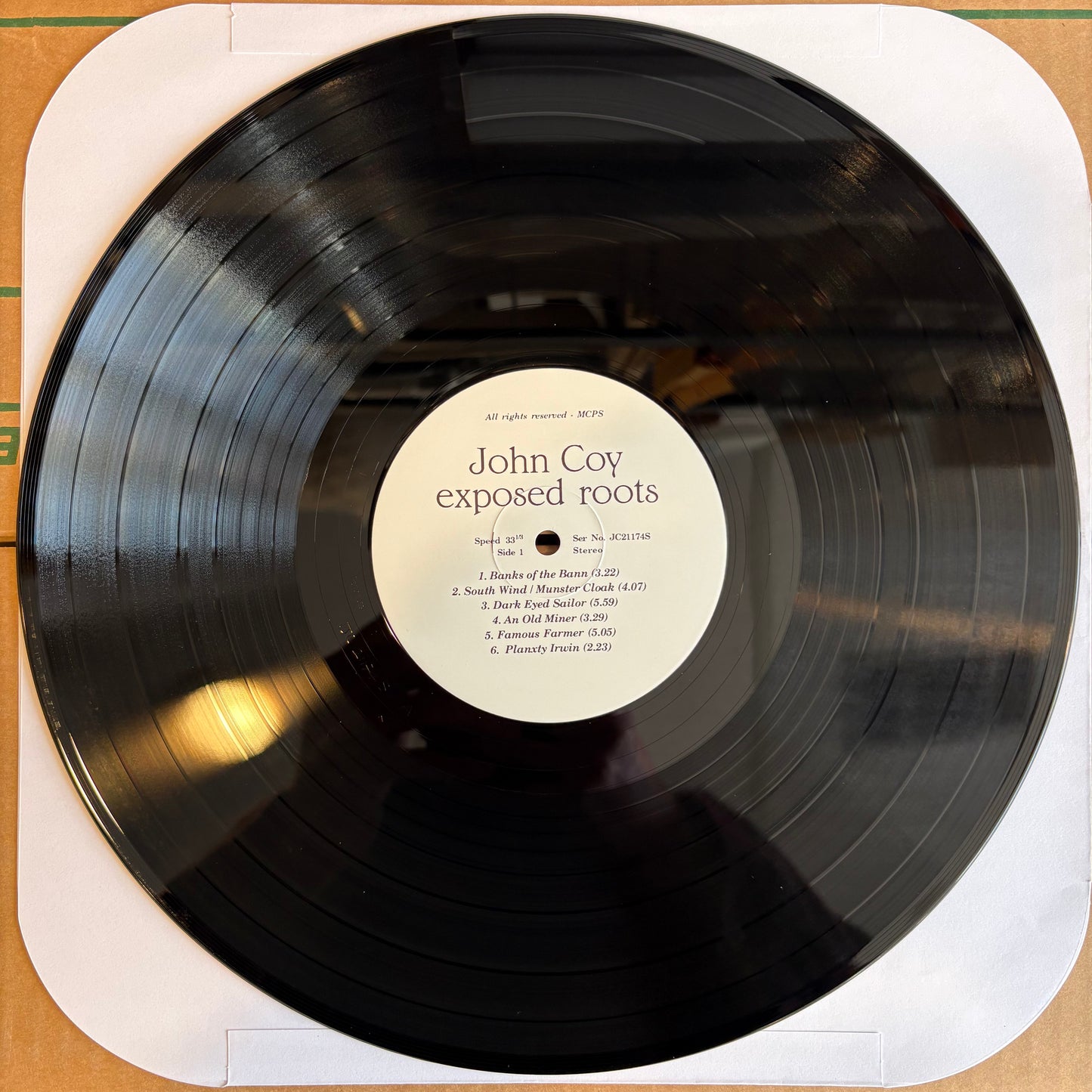 John Coy, "Exposed Roots" [VG Used]