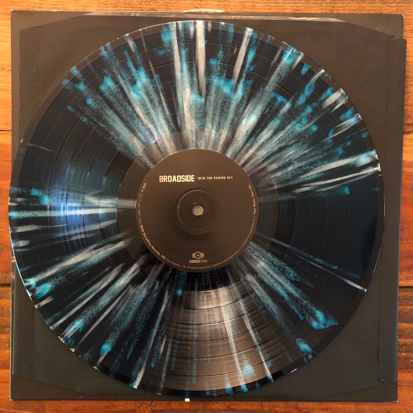 Broadside, "Into the Raging Sea" (Sea Blue w/ Bone Splatter) [Used]