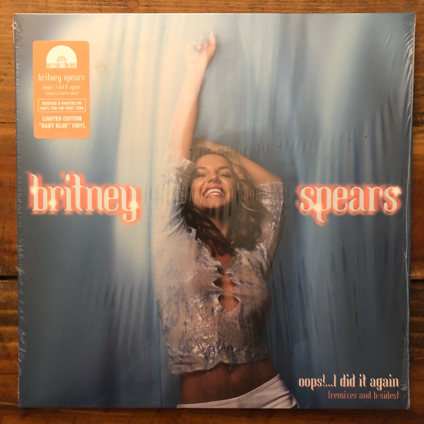 Britney Spears, "Oops!...I Did It Again (Remixes and B-Sides) (Baby Blue Vinyl) [Used]